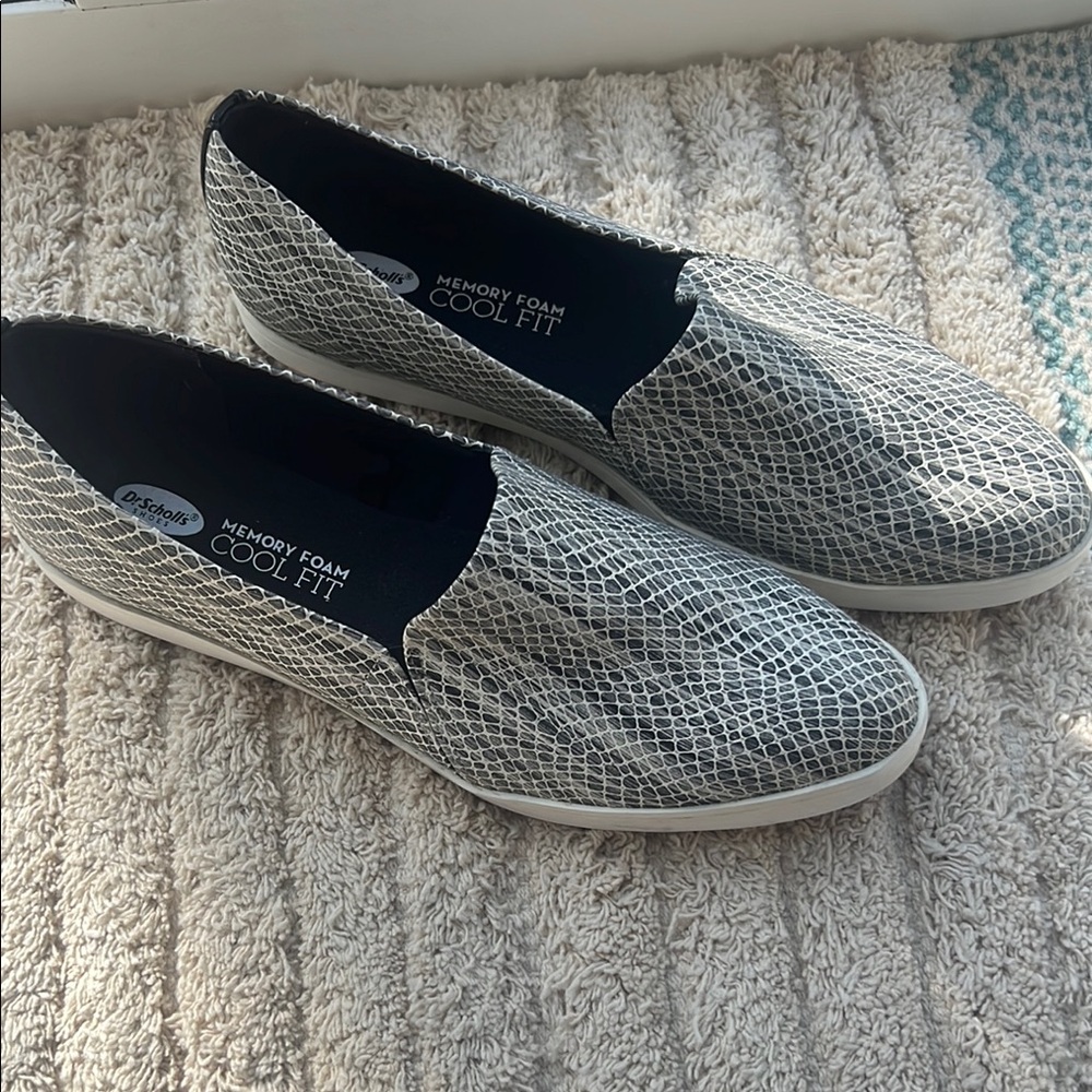 Skechers woman’s Gray Slip-On Shoes